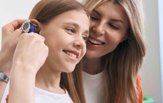 Apparecchi acustici per bambini: importanza e benefici